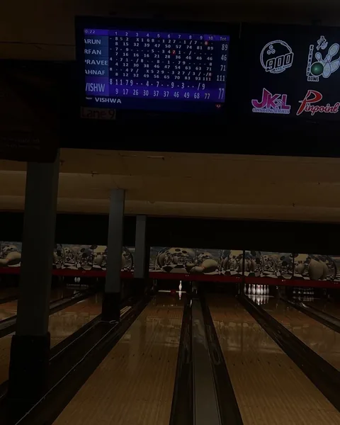 A bowling scoreboard with Ahnaf on top at 111